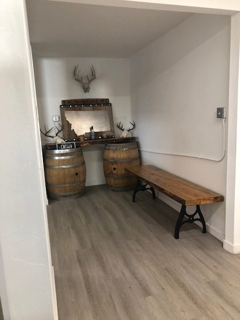 221 Commerce St. — bar/lounge area with Montana decor
