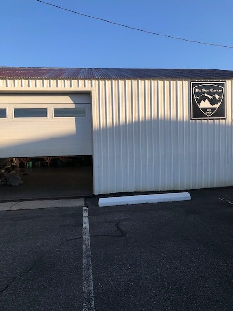 221 Commerce St. — full exterior view showing building and parking