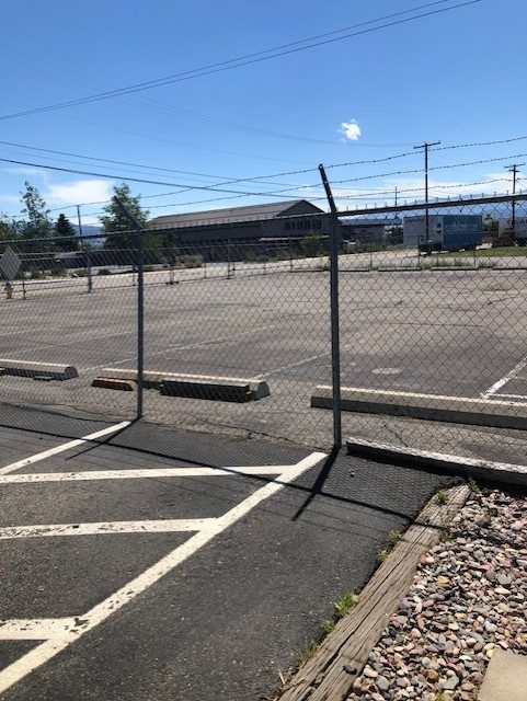 221 Commerce St. — fenced and secured ~50 space parking lot